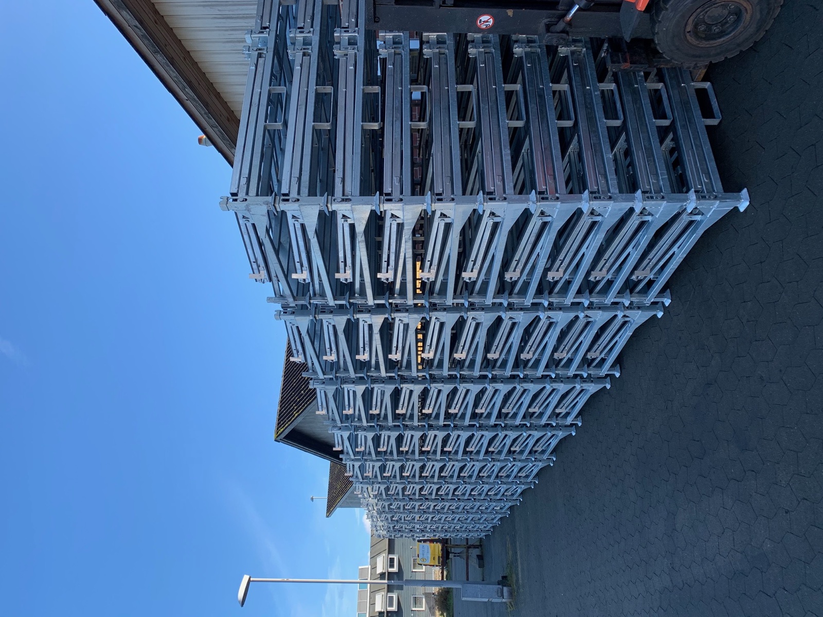 Folding L-Racks stacked for transport and storage