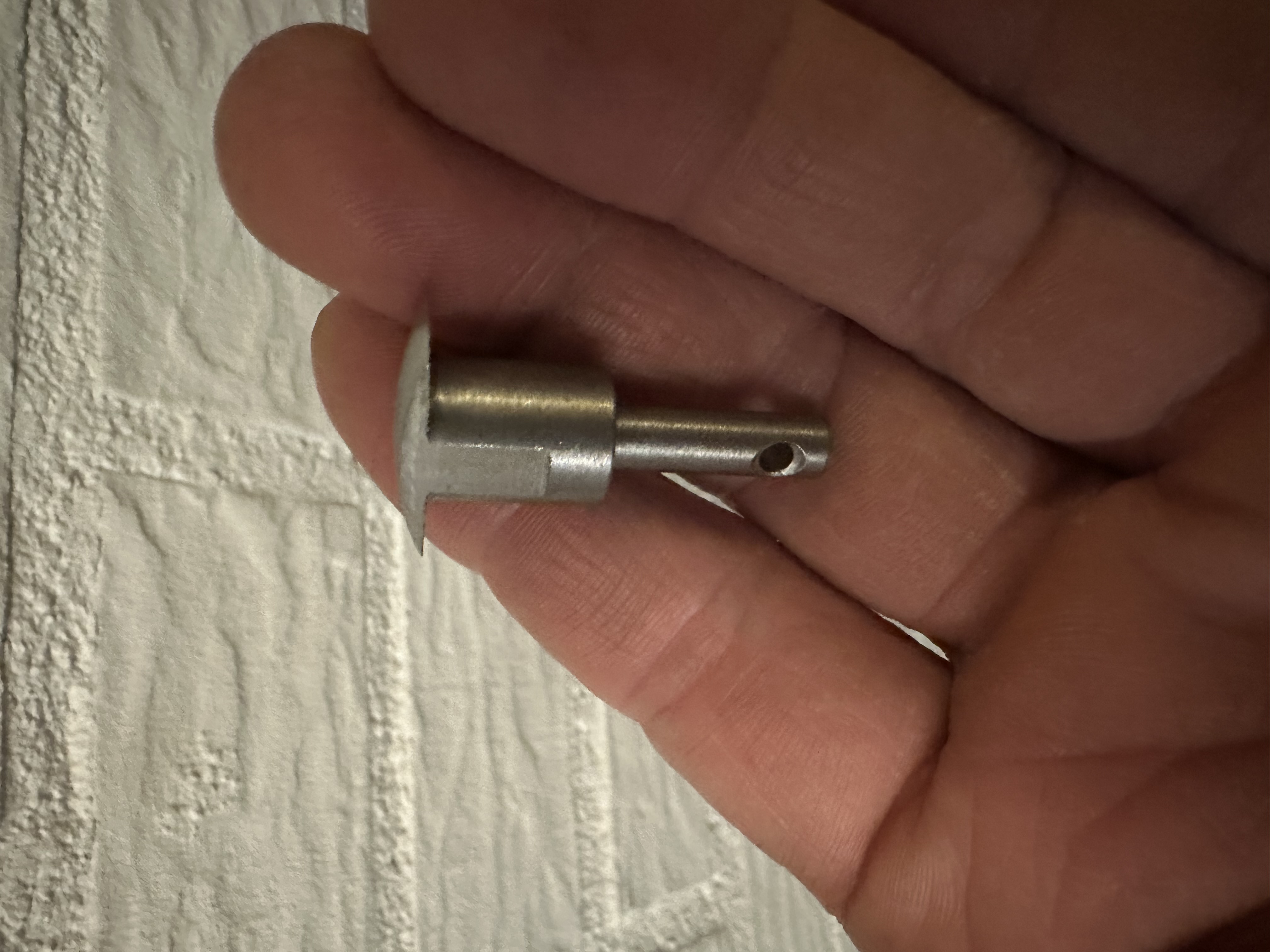 Close-up of a custom machined stainless steel part