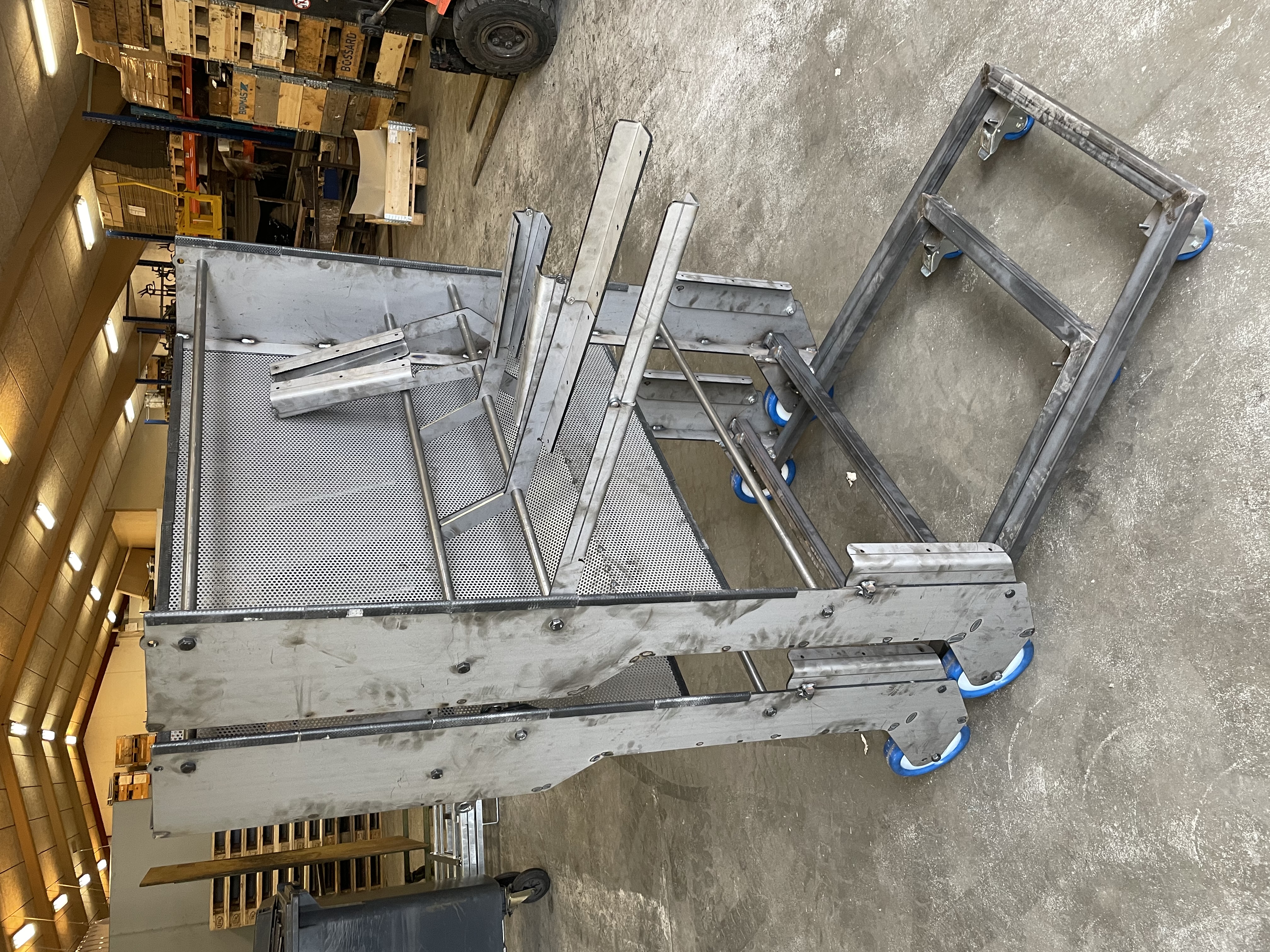 Large galvanised mobile frame with perforated panels