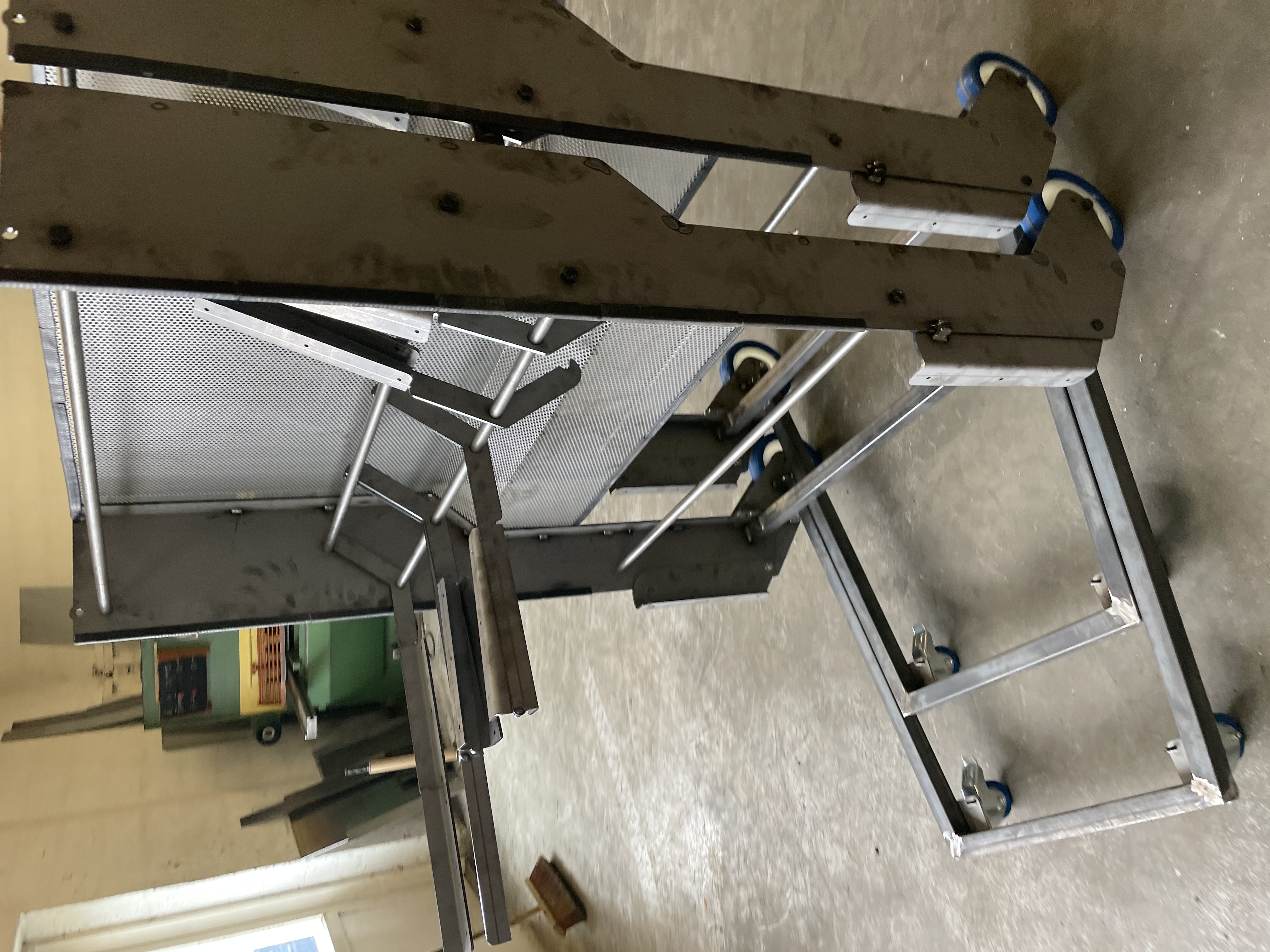 Custom mobile industrial frame with perforated panels