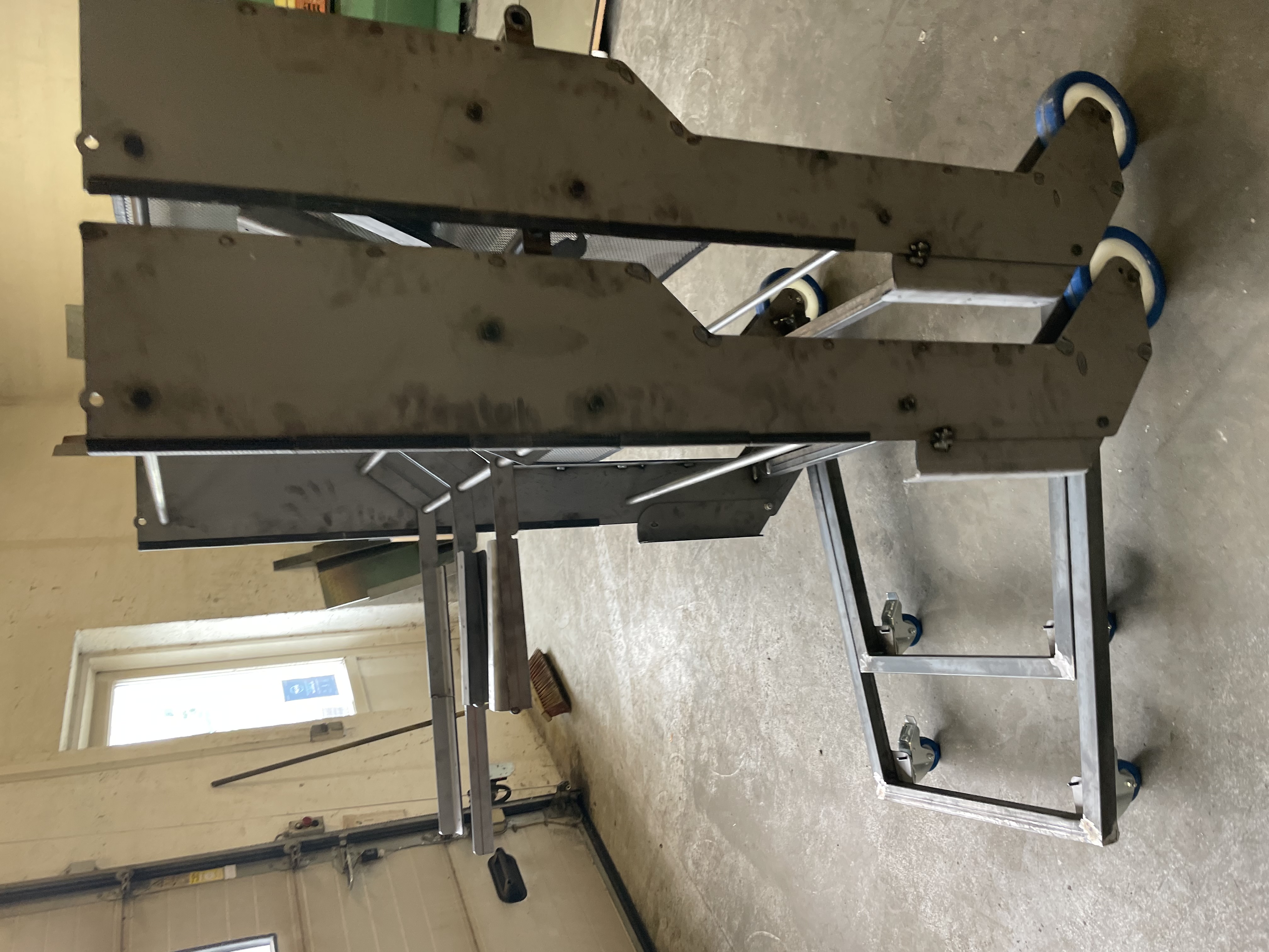 Side view of a custom wheeled industrial frame
